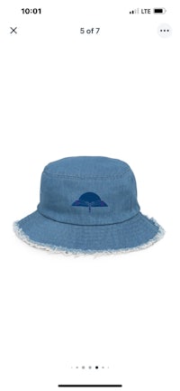 a blue bucket hat with an umbrella on it